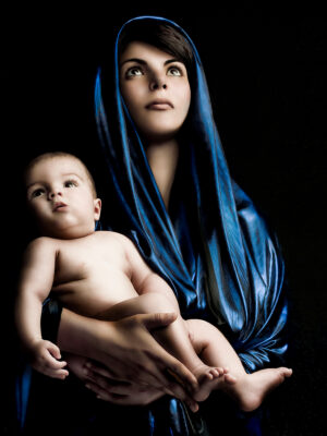 Photograph of a woman holding a newborn baby entitled VIRGIN-WITH-INFANT ©JulianneRose